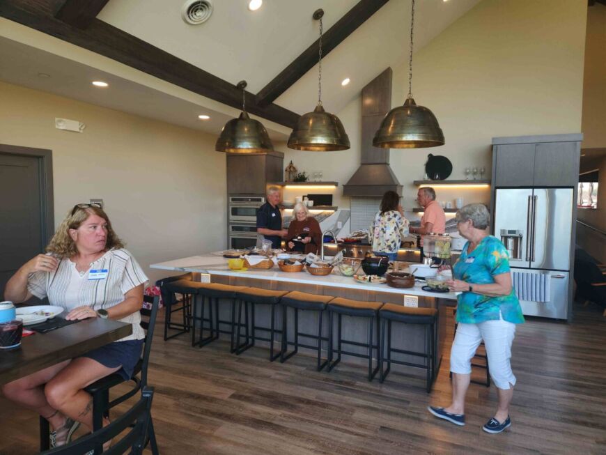 Residents gathering at the Siesta Hills clubhouse in Mankato Minnesota for a seasonal community get together