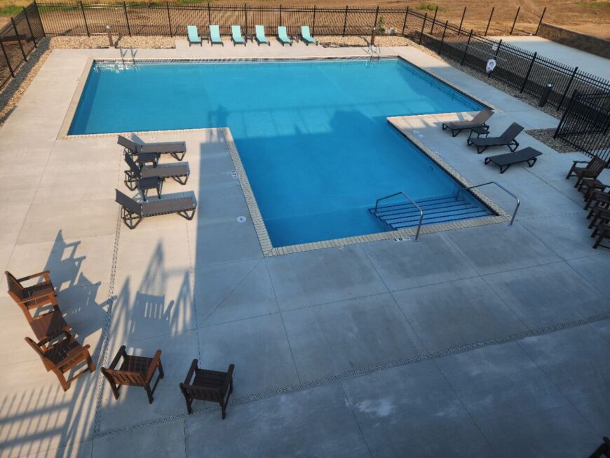 Siesta Hills outdoor pool and seating area at clubhouse in Mankato Minnesota