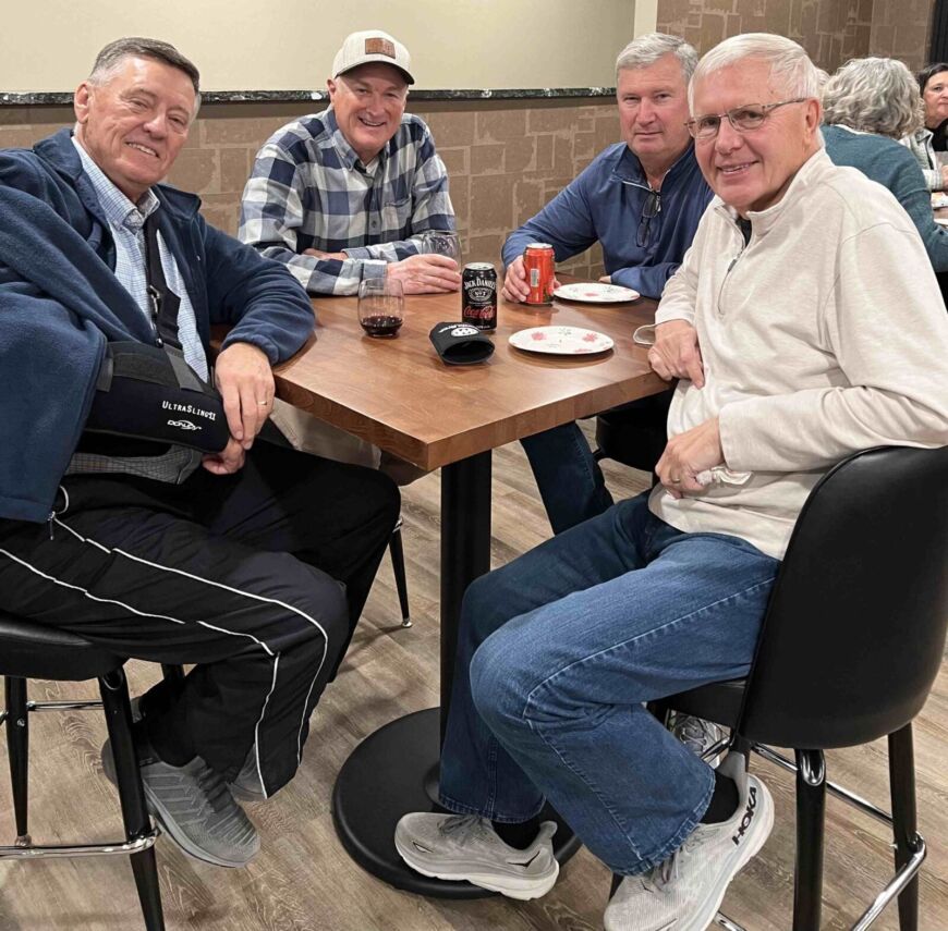 Siesta Hills residents enjoying conversation inside the clubhouse in Mankato Minnesota