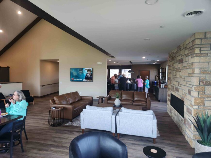 Siesta Hills clubhouse lounge area with seating and fireplace in Mankato Minnesota