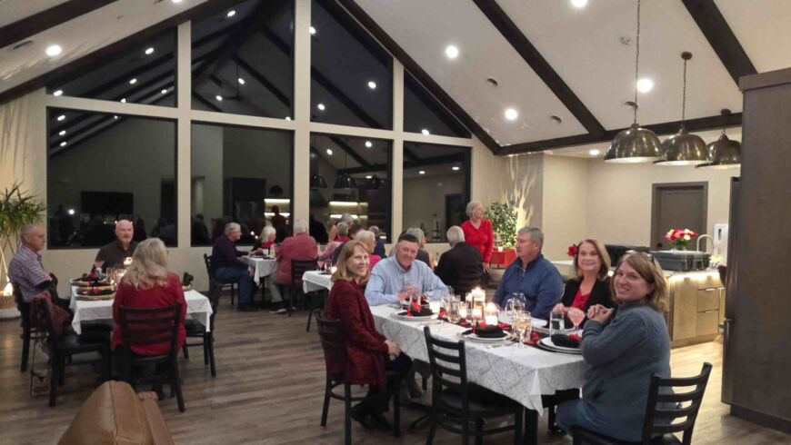 Residents attending the Valentine&rsquo;s Day Community Dinner at the Siesta Hills clubhouse in 2026.