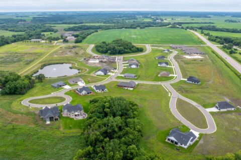 Aerial view of Siesta Hills planned residential community in Mankato Minnesota showing custom home lots, streets, and neighborhood layout.