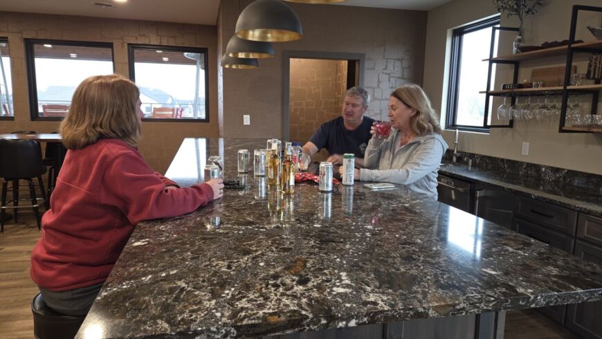 Residents enjoying happy hour at the Siesta Hills community clubhouse in Mankato Minnesota