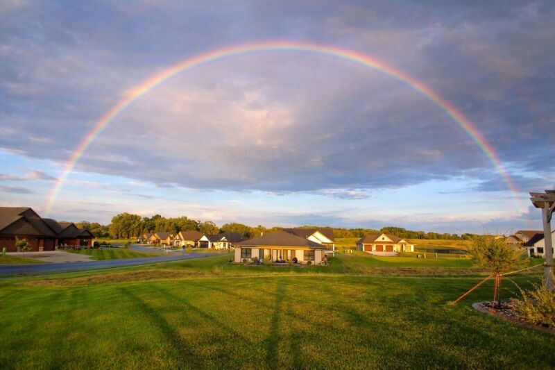 New construction homes in Siesta Hills Mankato Minnesota with scenic community view and rainbow