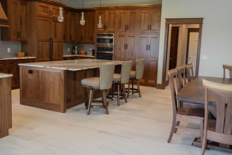 Kitchen cabinetry, countertops, flooring, and interior finish selections in a newly constructed Siesta Hills home in Mankato, Minnesota.